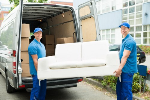 Workers and van logistics symbolising ethical transport operations