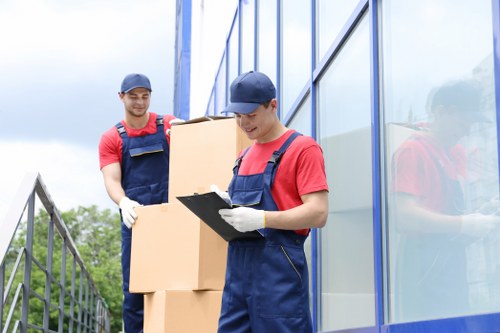 Team preparing a safe man and van move with protective equipment