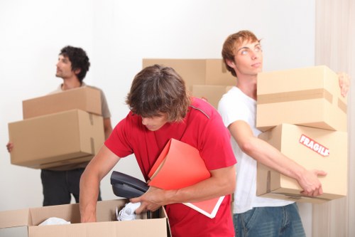 Careful loading of sofas and tables for local furniture removals