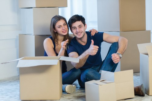 Workers loading furniture safely for a same day home or office move