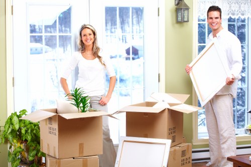 Local movers packing office equipment and files for a business relocation in Elephant And Castle