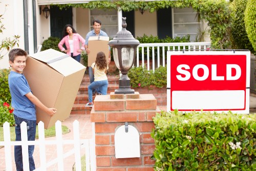 Moving crew inspecting and securing items for transport