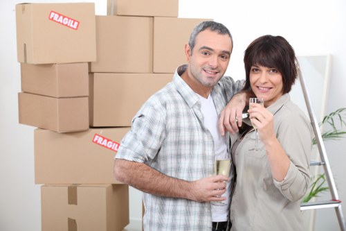 Professional movers handling flat access and stairs in South London
